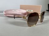chanel sunglasses in gold with brown lenses and pink case