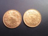 deux pièces d'or sur lesquelles figure un blason
