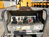 a machine that is sitting on the side of the road