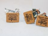 three cufflinks that are sitting on a table