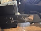 a close up view of a remote control in a car