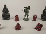 a lot of figurines that are sitting on a table