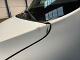a close up of a car with a denting on it