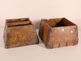 pair of antique wooden boxes with handles on a white background