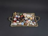 a tray with a lot of small objects on it