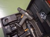 two tools that are in a case on a table