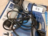 a box with a cord and a cord cutter on it