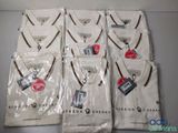 six men ' s white polo shirts with brown trimmings on them