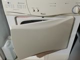 a white washer and dryer sitting next to each other