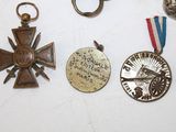 many medals and medals that are on a table