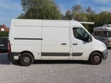 a white van that is parked in a parking lot