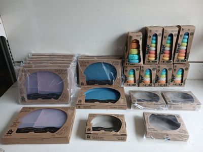 many boxes of different colors and designs on the table