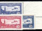 three stamps with a picture of a plane and a plane flying over them