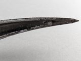 a close up of a pair of pliers on a table