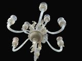 a chandelier made of glass with many lights on it