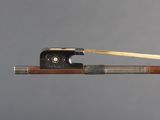 a bow that has a wooden handle on it