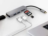 a close up of a laptop with a usb cable connected to it