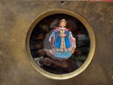 a picture of a picture of a woman in a dress in a frame
