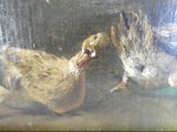 un tableau représentant deux oiseaux qui se disputent quelque chose