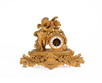 Pendule en régule doré mat et brillant à l'imitation du bron…