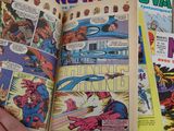 a person holding a comic book open on a table