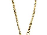 collier composé d'une chaîne en or et d'une pièce d'or sur fond blanc