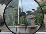 a man taking a picture of himself in a mirror