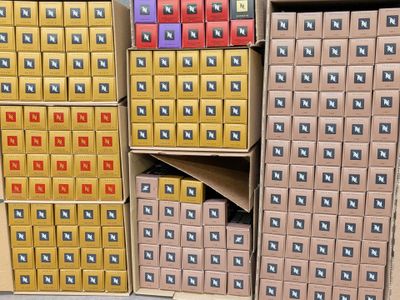several boxes are stacked on top of each other in a room