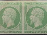 une paire de timbres représentant les visages d'un homme et d'une femme