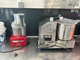 a blender and a blender sitting on a counter