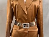 a close up of a mannequin wearing a brown jacket and belt