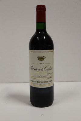 a bottle of wine that is sitting on a table