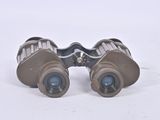 a pair of binoculars that are sitting on a table