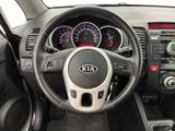 dashboard view of a car with a steering wheel and dashboard controls