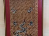 a picture of a picture of a dragon on the wall