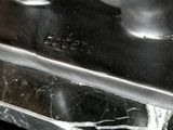 a close up of a metal object on a table