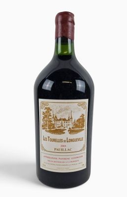 a bottle of wine that is sitting on a table