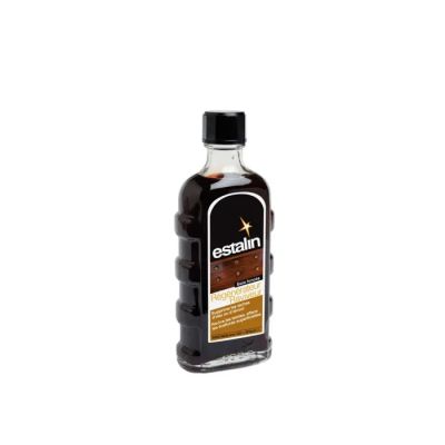 a bottle of coffee syrup on a white background