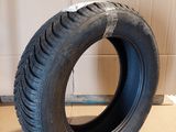 a tire that is sitting on a cardboard box