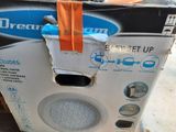 a box that has a toilet inside of it