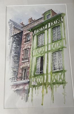 a picture of a painting of a building on the wall
