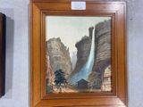 a painting of a waterfall on the wall next to a clock
