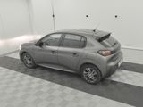 a picture of a car in a garage with a checkered floor