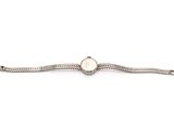 a close up of a bracelet on a white background