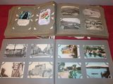 a lot of old photos on a red cloth