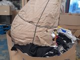 a cardboard boat that is sitting on top of a pallet