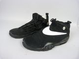 black and white nike air force basketball shoes on a white background