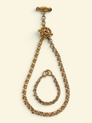 an image of a gold necklace with a chain hanging from it ' s end