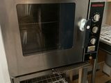 an image of a stainless steel oven in a kitchen