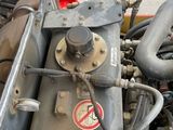 a close up of the engine of a construction vehicle